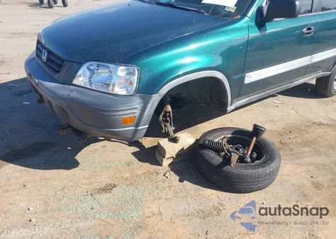 1999 Honda Cr-V Lx z USA, uszkodzony, nr VIN JHLRD1848XC041206